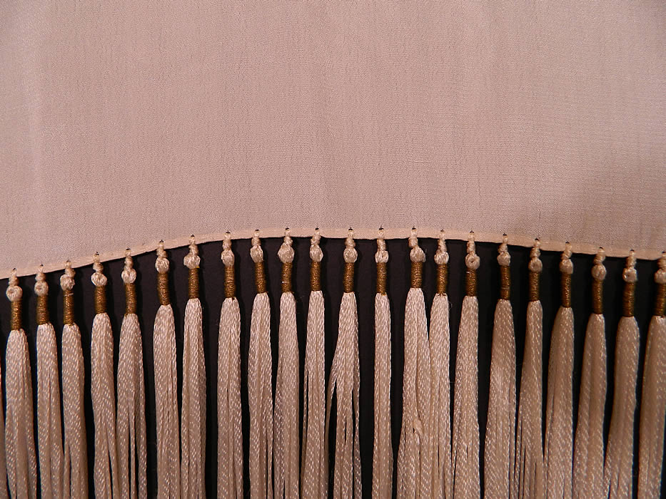 Vintage Silver & Gold Lame Lam&eacute; Cream Silk Fringe Flapper Piano Shawl. It is in excellent condition. This is truly a wonderful rare piece of wearable Art Deco textile art!