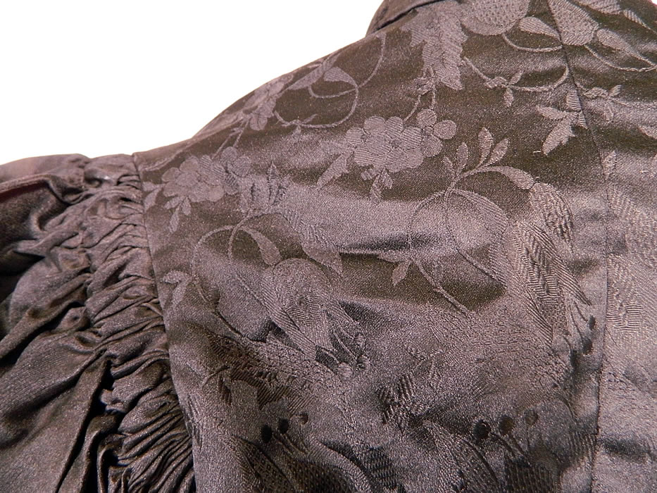 Victorian Black Silk Damask Brocade Gigot Mutton Sleeve Shirt Bodice. The bodice measures 16 inches long, with a 28 inch waist, 34 inch bust, 10 inch back and 22 inch long sleeves