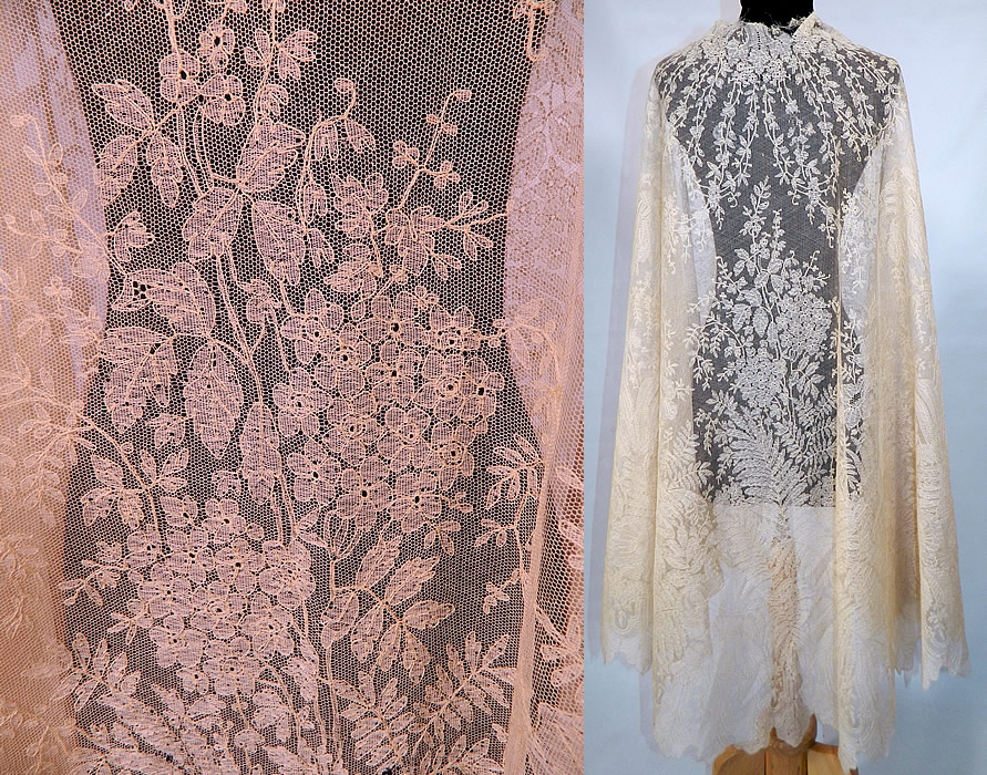 Victorian Civil War Antique Blonde Chantilly Lace Mantilla Shawl Cloak Cape. It is made of a sheer fine delicate blonde net French chantilly bobbin lace, with a floral foliage leaf pattern outlined in off white cream colored threads with detailed shading effects and a beautiful decorative scalloped border edging.
