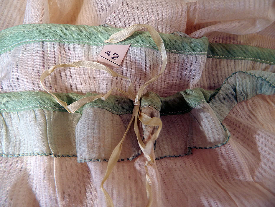 Vintage Mint Green Cotton Organdy Belted Dress & Chemise Teddy Slip. It is in good condition, but has not been cleaned, with some discoloration age spot staining on both pieces and underarm stains on the dress (see close-ups). This is truly a wonderful piece of wearable art!