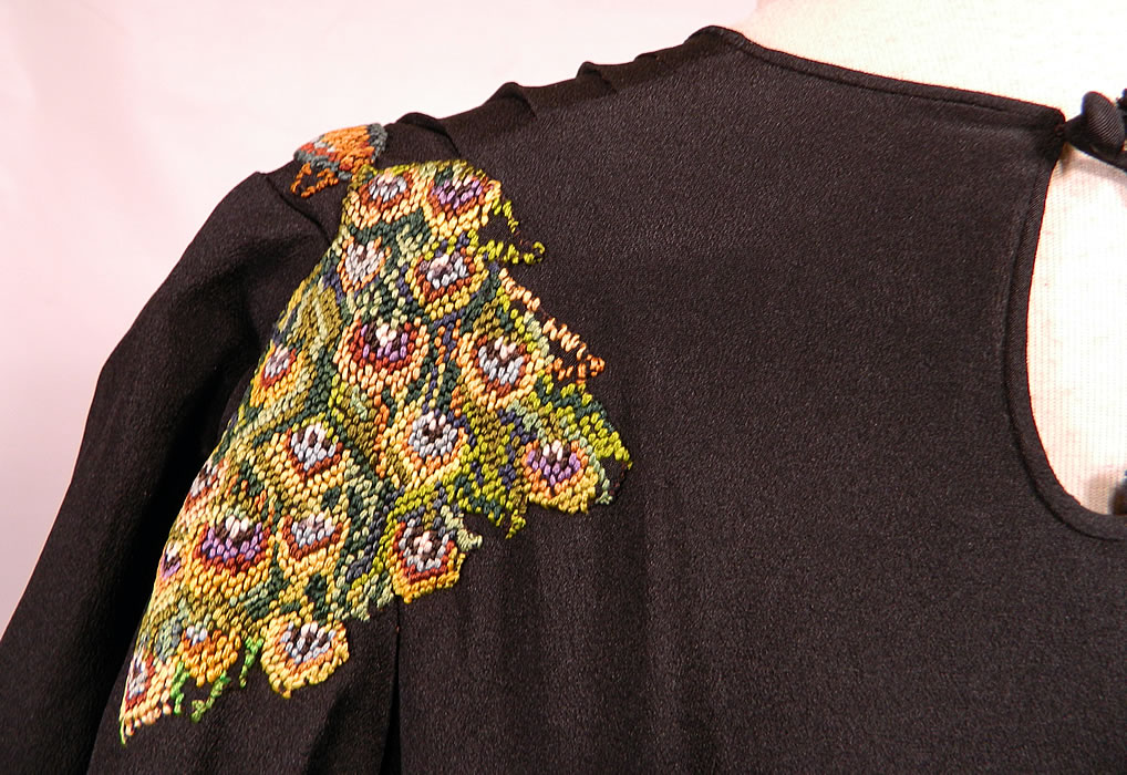 Vintage Black Silk Crepe Peacock Embroidered Needlepoint Maxi Dress Gown. The dress measures 57 inches long, with 38 inch hips, a 30 inch waist, 38 inch bust and 27 inch long sleeves. It is in good condition, with only some fraying on the inside top silk lining. This is truly a rare and exceptional quality made piece of wearable art! 