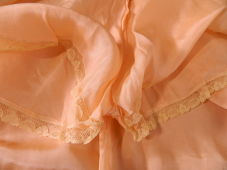 Vintage Flapper Underwear Pink Silk Cream Lace Lingerie Chemise Teddy Slip. The teddy measures 27 inches long, with 36 inch hips, a 34 inch waist and 36 inch bust. It is in excellent condition and appears to have never been worn. This is a wonderful piece of fine quality romantic wearable flapper lingerie art! 