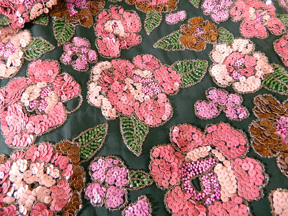 Vintage Green Silk Pink Sequin Beaded Floral Drop Waist Flapper Dress Slip
This fabulous flapper dress has a loose fitting drop waist straight shift slip style, sleeveless, with silver sequin beaded shoulder straps, a scalloped skirt hem and is unlined. 