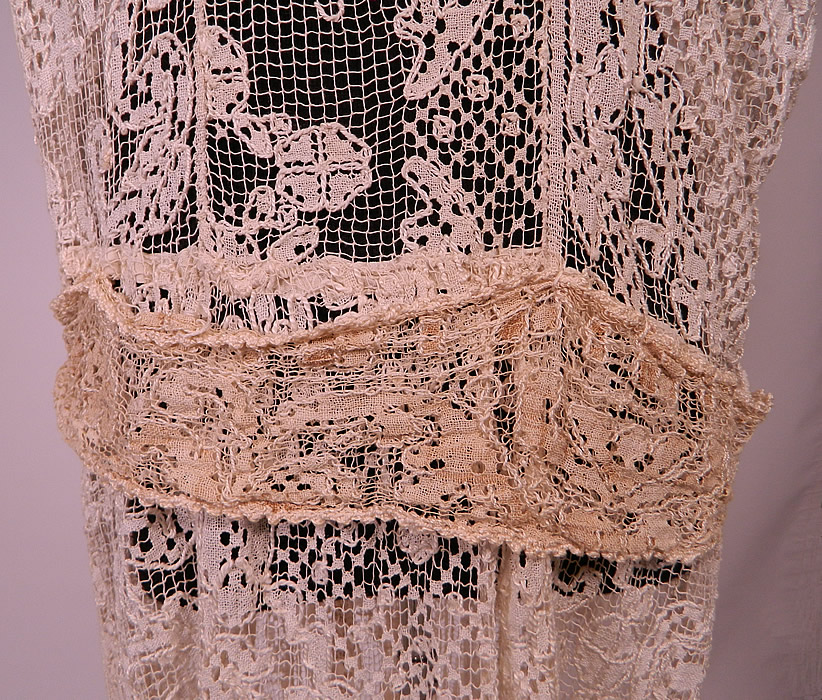 Vintage Cream Crochet Filet Lace Belted Drop Waist Maxi Dress
This lovely lace boho maxi dress is a long floor length, with a loose fitting, drop waist style, short cap sleeves, a squared neckline, ecru crochet lace attached belted tie sash and is sheer, unlined. 