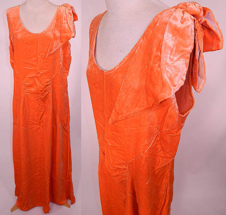 Vintage Orange Silk Velvet Bias Cut Evening Gown Dress
This vintage orange silk velvet bias cut evening gown dress dates from the 1930s. It is made of a luscious orange color luxurious silk velvet fabric. This beautiful bias cut evening gown dress is a long floor length, sleeveless, with a matching fabric bow tie trim sash on one shoulder, rounded scoop necklines, side snap closures and is unlined.