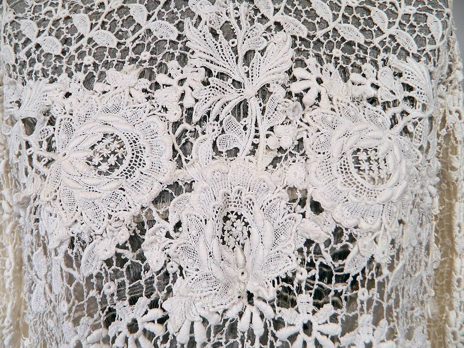 Edwardian White Point de Venise Needle Lace Applique Blouse Shirt Top
The top measures 21 inches long, with a 24 inch waist, 34 inch bust and 14 inch back. It is in good condition, but the inside silk lining has several frays, needs replacing and the lace collar has some breaks & holes (see close-up). This is truly a wonderful piece of antique textile lace wearable art! 