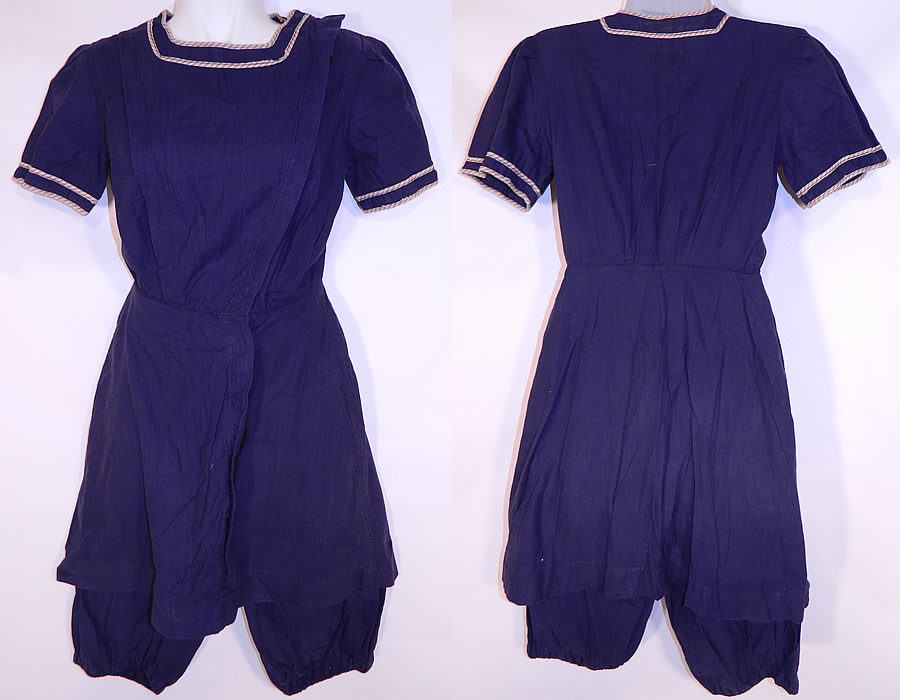 Vintage Water Sprite Edwardian Blue Bathing Suit Swimsuit Dress & Bloomers
This vintage Water Sprite Edwardian era blue bathing suit swimsuit dress and bloomers dates from 1910. It is made of a navy blue cotton fabric, with a tan & white stripe trim edging around the neckline collar and sleeve cuffs.