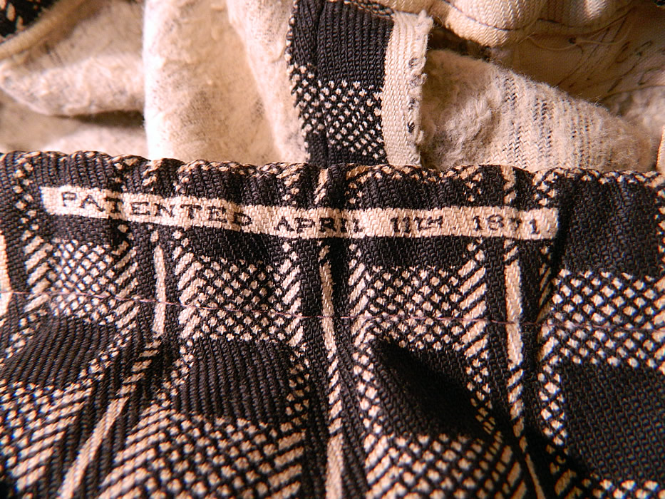 Victorian Black & White Flannel Cotton Calico Floral Plaid Print Petticoat Skirt
This wonderful winter petticoat skirt has a drawstring waist, back closure, stamped "Patented April 11th 1871" around the waistband and has a soft flannel backed lined fabric. The petticoat measures 37 inches long, with an adjustable up to 34 inch waist. 