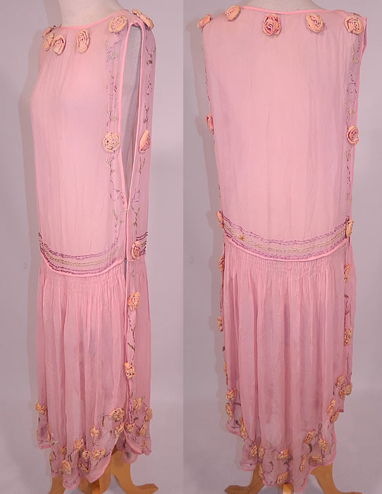 Vintage Pink Silk Chiffon Velvet Rosette Flower Trim Open Side Tunic Flapper Dress
The dress measures 51 inches long, with 30 inch hips, a 30 inch waist and 30 inch bust. 