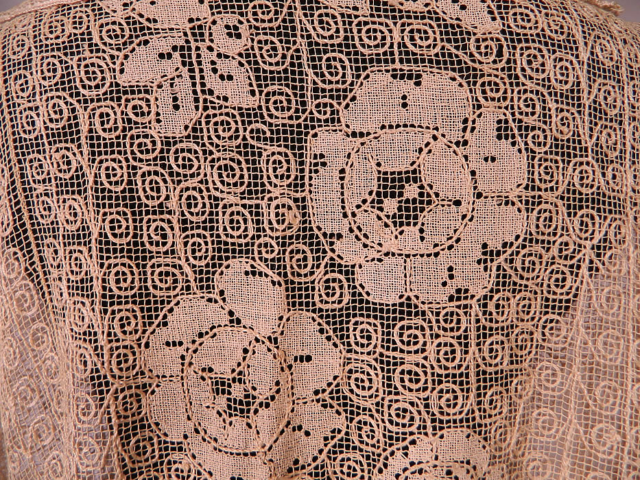 Vintage Ecru Cream Crochet Filet Lace Button Trim Drop Waist Dress
The dress is a large size measuring 45 inches long, with 38 inch hips, a 40 inch waist and 40 inch bust. It is in excellent condition. This is truly a wonderful piece of wearable lace art!