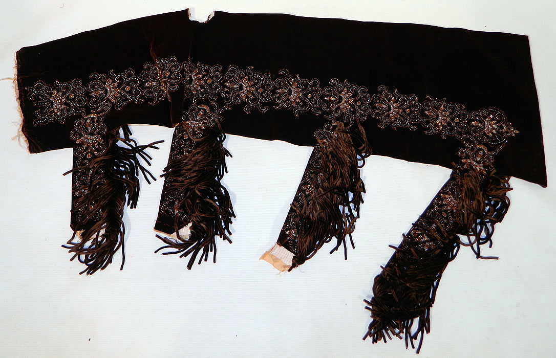 Victorian Brown Silk Velvet Bronze Beaded Bodice & Skirt Fabric Remnant Trim
There is a matching velvet beaded fabric remnant skirt panel with brown silk chenille fringe tassel trim along the four strips and is lined, backed in a yellow silk fabric. 
