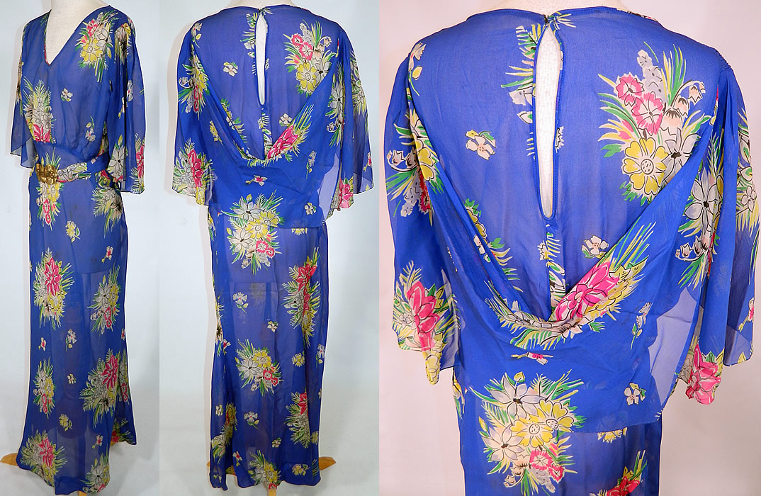 Vintage Blue Silk Chiffon Floral Bouquet Print Belted Bias Cut Dress. 
The dress measures 58 inches long, with 40 inch hips, a 36 inch waist and 40 inch bust. It is in good condition, has not been cleaned, with only a few faint small stains on the front skirt. This is truly a wonderful piece of wearable art! 