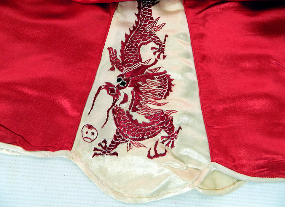Vintage Red & White Silk Embroidered Asian Chinese Dragon Pajamas. 
It is in good condition. This is truly a wonderful piece of wearable Asian textile art! 