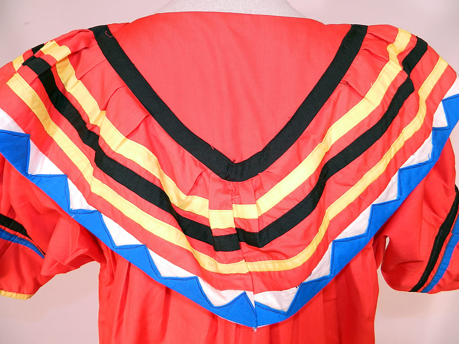 Vintage Seminole Native American Indian Sawtooth Patchwork Colorful Boho Maxi Dress
The dress measures 54 inches long, with 46 inch hips, a 46 inch waist and a 36 inch bust. It is in good condition. This is truly a wonderful piece of Florida Seminole Native American Indian wearable folk art! 