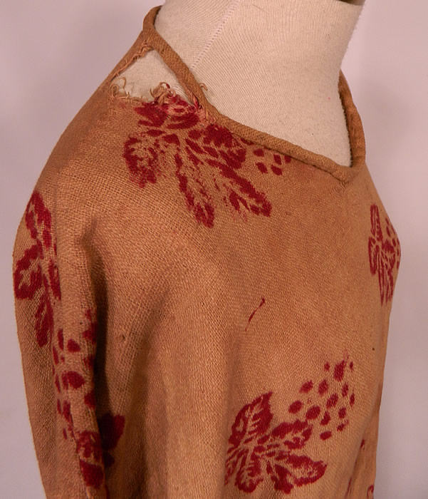 Antique 19th Century Nepalese Nepal Hindu Lakhe Mask Dance Dress Kimono Sleeve
The dress measures 57 inches long, with a 52 inch waist and chest. It is in good condition, but does have a worn, distressed primitive look with some yellowing discoloration stains, mended repairs and a frayed neckline & skirt. This is truly a rare and unique piece of antique Nepalese textile folk art! 