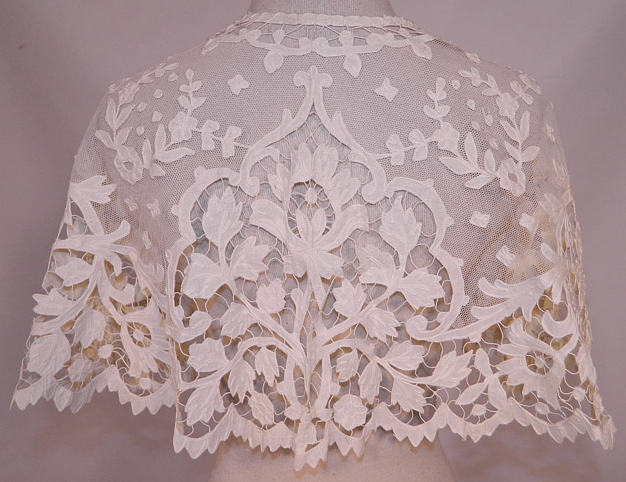 Victorian Antique Applique Cream Net Battenburg Tape Lace Pelerine Shawl Collar Cape
This lovely lace large shawl style collar pelerine has a wide circular shape, with a scalloped bottom edging, open front with no closure and is sheer,completely unlined