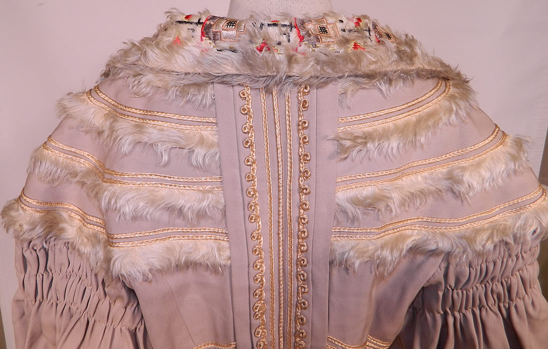 Edwardian Hetzel Importing Co Gray Wool White Mohair Lace Trim Winter Traveling Coat
The coat measures 47 inches long, with 50 inch hips, a 34 inch waist, 38 inch bust, 18 inch back and 17 inch long sleeves.