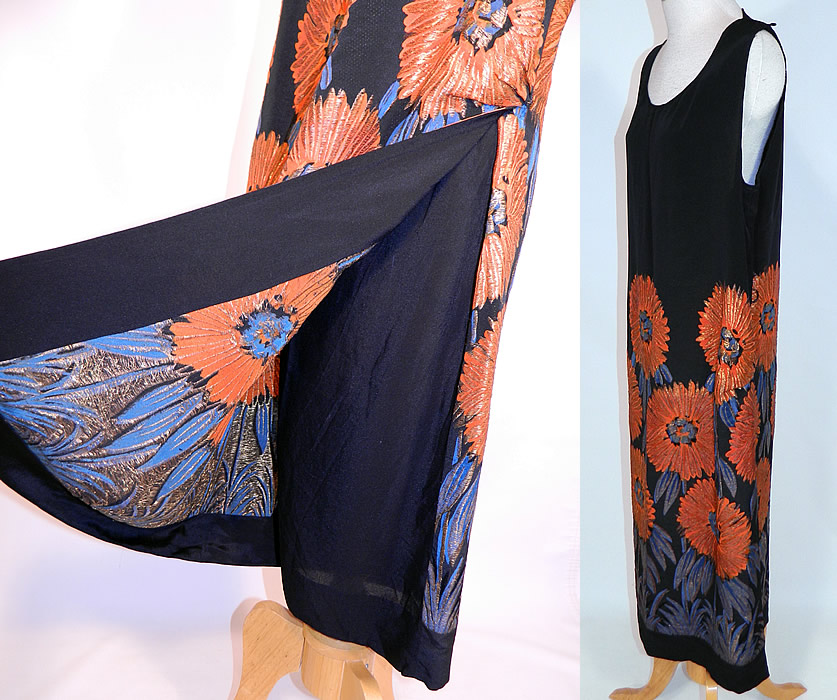 Vintage Art Deco Black Silk Gold Lamé Lame Orange Sunflower Flapper Dress
This fabulous flapper dress has a straight shift loose fitting, long drop waist style, sleeveless, with wide armhole openings, a fold over drape skirt front panel and is unlined.