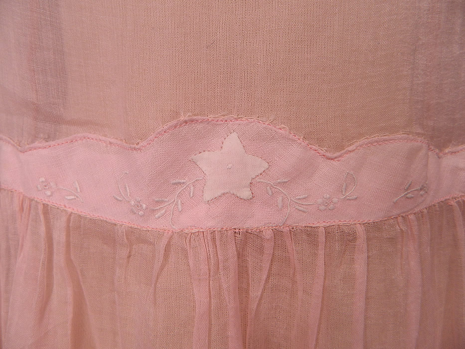 Vintage Pink Pastel Pink Organdy White Embroidered Star Applique Party Dress
It is made of a pale pastel pink sheer organdy fabric, with a white star appliqué and embroidered flower trim on the front waist. 
