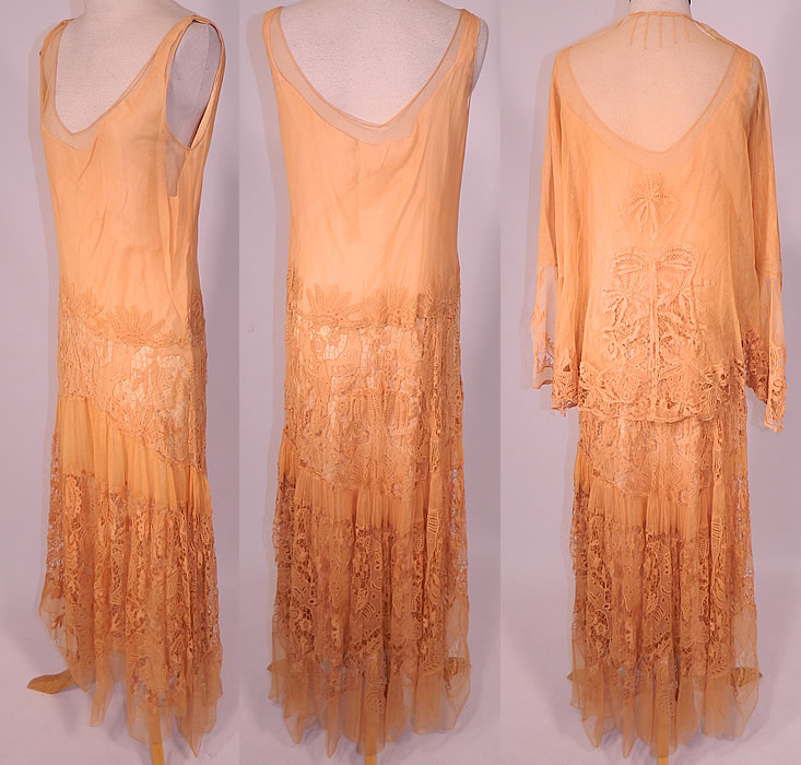 Vintage Peach Net Battenburg Lace Drop Waist Dress Silk Slip & Jacket Outfit
The jacket measures 23 inches long, with a 36 inch waist, 36 inch bust, 14 inch back and 23 inch long sleeves. Included is a matching peach color silk slip for wearing underneath.
The slip measures 48 inches long, with 42 inch hips, a 36 inch waist and 38 inch bust. It is in excellent clean condition. This is truly an exquisite piece of wearable lace art!