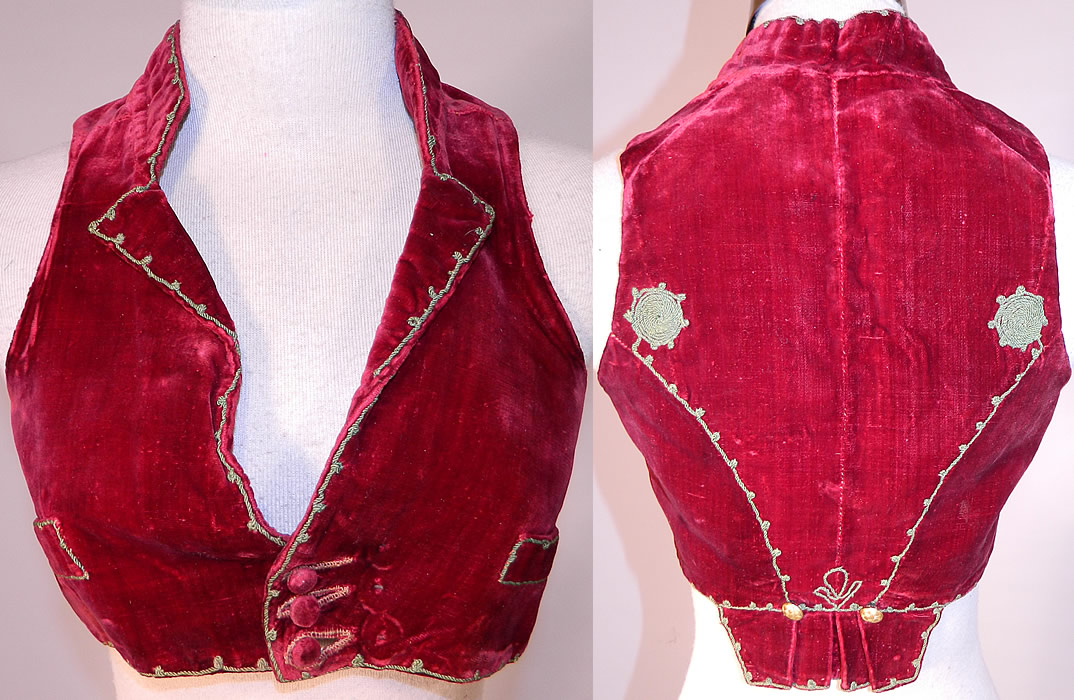 Vintage Regional Folk Costume Spanish Soutache Embroidery Red Velvet Vest
This antique vintage regional folk costume Spanish soutache embroidery red velvet Spencer waistcoat vest dates from the early 19th century. It is hand stitched, made of a red silk velvet fabric, with gold rope soutache embroidery work decorative trim edging.