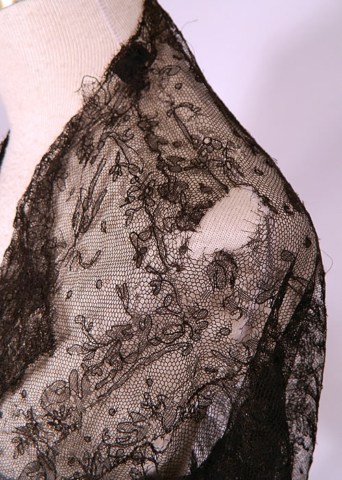 Victorian Civil War Antique Black Chantilly Lace Shawl Jacket Pagoda Sleeve
It is in as-is fair fragile condition, with several small frayed holes along the shoulders, on the back sleeve seam and bottom front (see close-ups). This is still a wonderful piece of antique Victoriana lace art! 