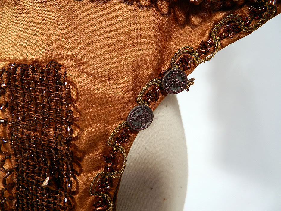 Victorian Civil War Brown Silk Bronze Beaded Bodice Bolero Cropped Spencer Jacket
The jacket measures 9 inches long, with a 22 inch waist, 30 inch bust, 12 inch back and 20 inch long sleeves.