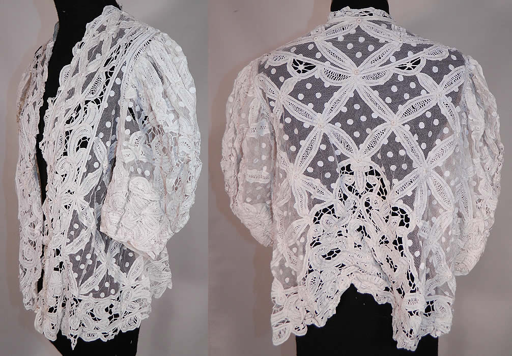Vintage Edwardian Antique White Polka Dot Net Battenburg Crochet Tape Lace Blouse Jacket
This lovely lace blouse style jacket is loose fitting, with an open front, no closure, gathered shoulders, full puffy short sleeves, scalloped trim edging, a fitted shorter back and is sheer, completely unlined.