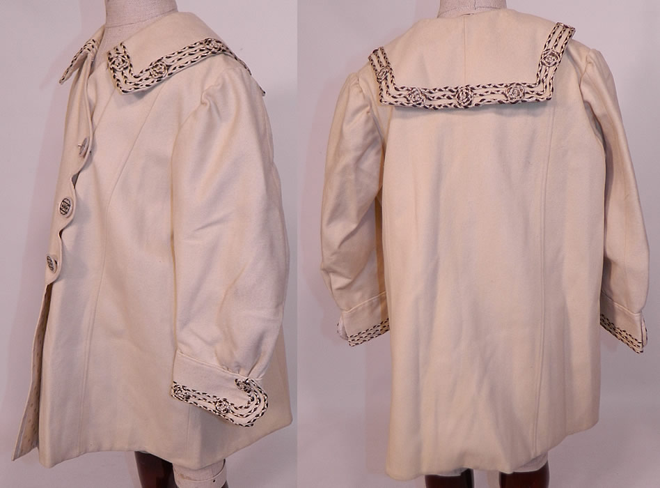 Edwardian White Wool Silver Soutache Braided Trim Childs Winter Coat
This charming child's wonderful winter traveling coat has a loose fitting, long full style, with a sailor style shawl collar, long sleeves with fitted trimmed cuffs, scalloped edge side front closure with 3 carved etched mother of pearl silver inlaid buttons and is fully lined in a polka dot white silk damask fabric inside.