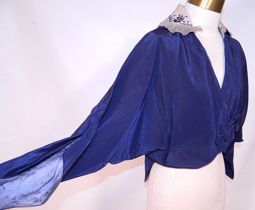 Titanic Era Edwardian Blue Silk Dolman Sleeve Short Crop Coat Bolero Jacket
It is made of a dark blue silk fabric, with a white silk, colorful chain stitch embroidered, net ruffle trim collar.