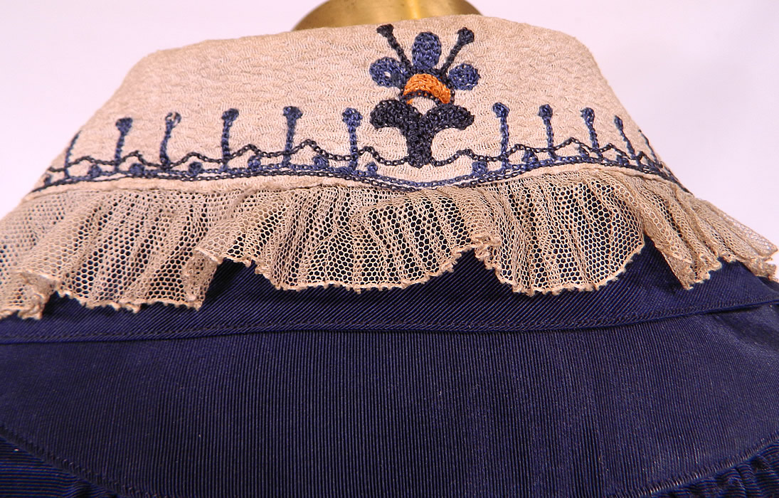 Titanic Era Edwardian Blue Silk Dolman Sleeve Short Crop Coat Bolero Jacket

The jacket measures 15 inches long in the front, 22 inches long in the back, with a 32 inch waist and 36 inch bust. It is in good condition, with some fraying splits on the inside silk lining. This is truly a wonderful piece of wearable Titanic era art! 
