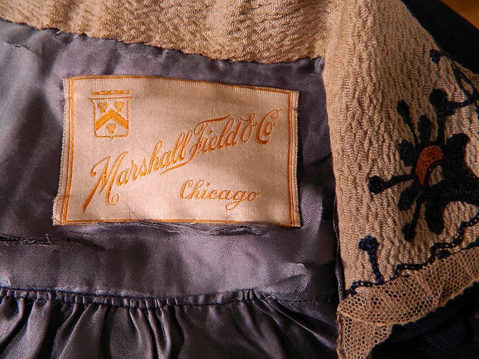 Titanic Era Edwardian Blue Silk Dolman Sleeve Short Crop Coat Bolero Jacket

There is a "Marshall Field & Co. Chicago" store label sewn inside. 