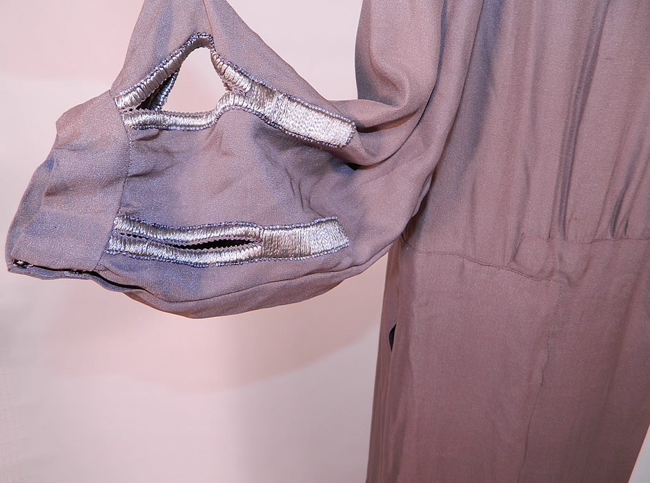 Vintage Art Deco Gray Silk Embroidered Silver Beaded Flapper Drop Waist Dress
This is truly an amazing piece of Art Deco wearable beaded textile art! 