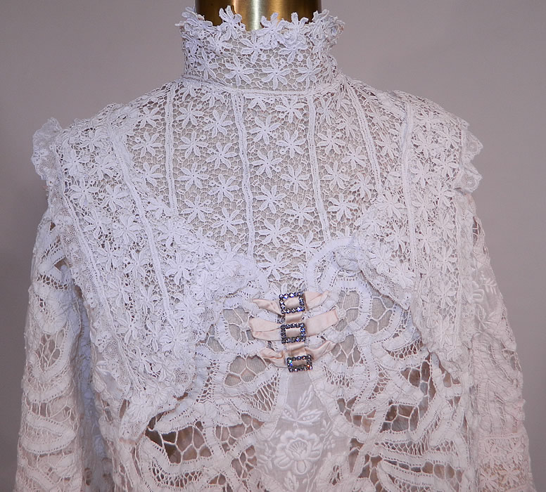 Edwardian White Battenburg Tape Lace Embroidered Applique Blouse Shirt Top
This beautiful blouse has a high neck lace collar, with steel cut buckles, cream silk bow trim on the front, 3/4 length sleeves, hook closures down the back and is sheer completly unlined