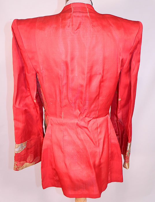 Vintage Japanese Kimono Obi Red Silk Gold Lame Broad Shoulder Jacket Lamé
The jacket measures 28 inches long, with 36 inch hips, a 26 inch waist, 34 inch bust, 15 inch back and 23 inch long sleeves. It is in good condition, with only a small frayed seam on the back. This is truly a wonderful piece of wearable Japanese textile art!