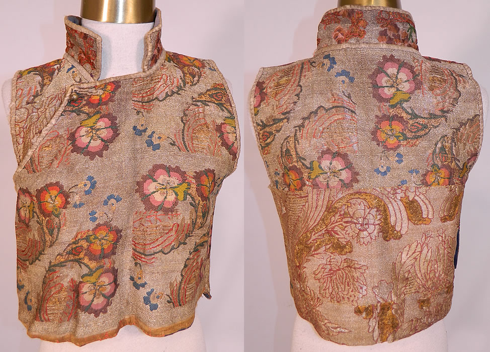 Antique 19th Century Chinese Tibetan Gold Lame Brocade Sleeveless Monks Vest Lam&eacute;
This antique Chinese Tibetan gold lam&eacute; brocade sleeveless monks vest dates from the early 19th century. It is hand stitched, made of a beautiful brocade fabric woven with gold lam&eacute; metallic thread and colorful silk threads creating a fabulous floral leaf weave pattern design.