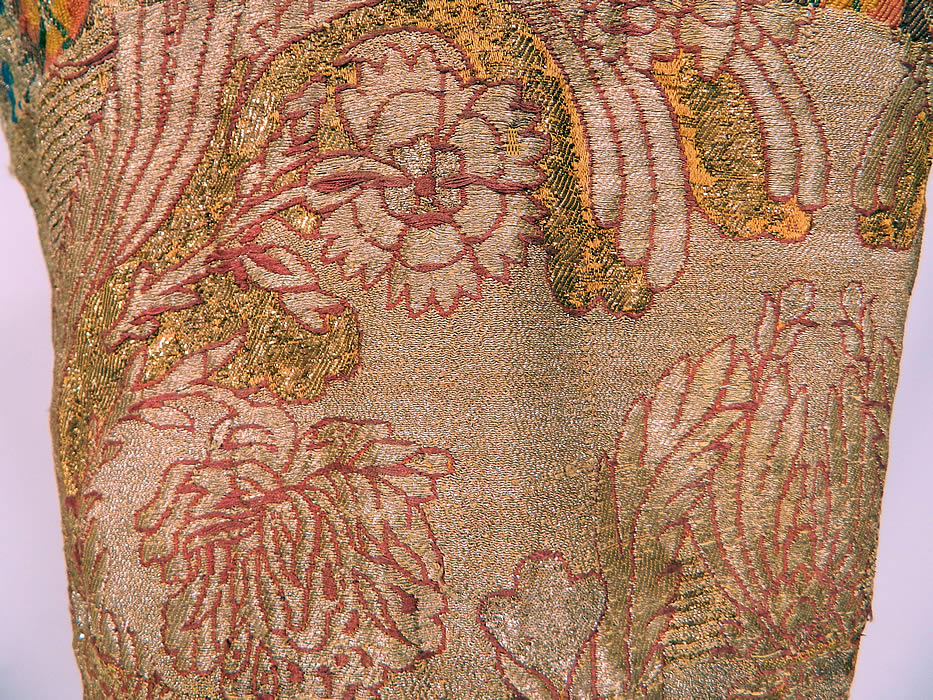 Antique 19th Century Chinese Tibetan Gold Lame Brocade Sleeveless Monks Vest Lam&eacute;
It is in good condition, with only some minor wear. This is truly a rare and wonderful piece of wearable antique Chinese Tibetan textile art! 