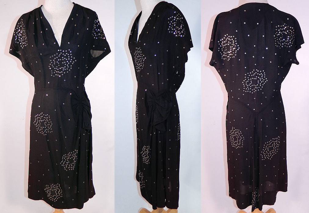 Vintage Black Silk Silver Metal Sequin Studded Beaded Cocktail Dress
This vintage black silk silver metal sequin studded beaded cocktail dress dates from the 1940s. It is made of a black silk knit jersey fabric, with silver metal sequins studded and beaded throughout in an abstract floral design.
