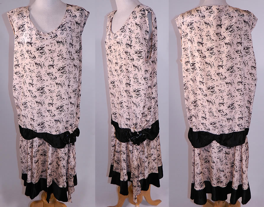 Vintage Black & White Goose Duck Novelty Print Silk Sleeveless Drop Waist Dress
This vintage black and white goose duck novelty print silk sleeveless drop waist dress dates from the 1920s. It is made of an off white silk crepe de chine fabric, with a black goose duck bird water fowl novelty print pattern design.