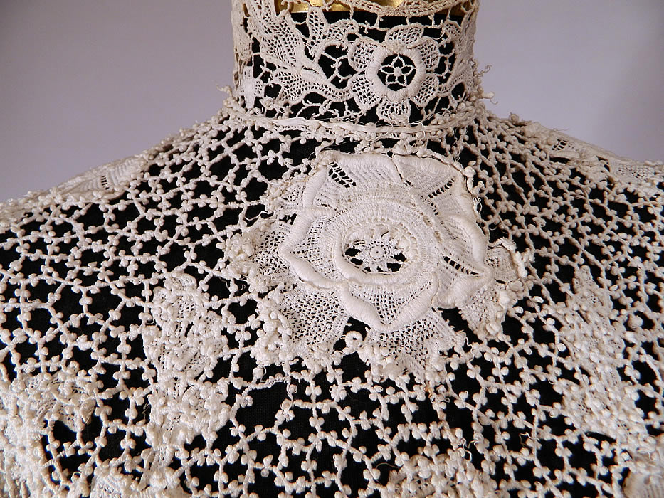 Edwardian White Point de Venise Needle Lace Applique Blouse Shirt Top
This beautiful blouse has a high neck lace collar, long tapered sleeves, snap closures down the back and is sheer, unlined.