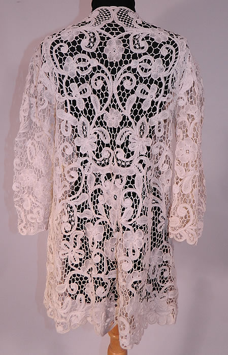 Vintage Edwardian Antique White Bobbin Lace Long Coat Jacket
The coat measures 30 inches long, with 40 inch hips, a 34 inch waist, 36 inch bust, 14 1/2 inch back and 14 inch long sleeves. 
