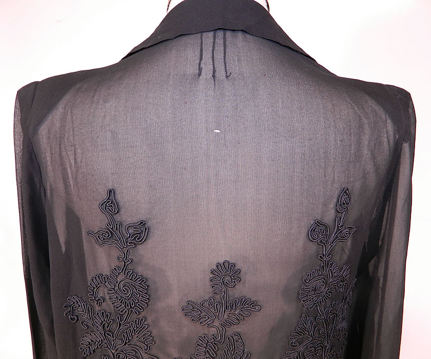 Vintage Black Silk Soutache Embroidered Drop Waist Dress
The dress measures 43 inches long, with 36 inch hips, a 34 inch waist, 36 inch bust and 24 inch long sleeves. It is in good condition, with only a tiny pin hole on the back top (see close-up). This is truly a wonderful piece of Art Deco wearable textile art! 