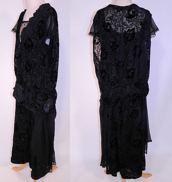 Vintage Silver Lace Black Burnout Voided Velvet Silk Drop Waist Flapper Dress
The dress measures 47 inches long, with 38 inch hips, a 38 inch waist and 36 inch bust. 