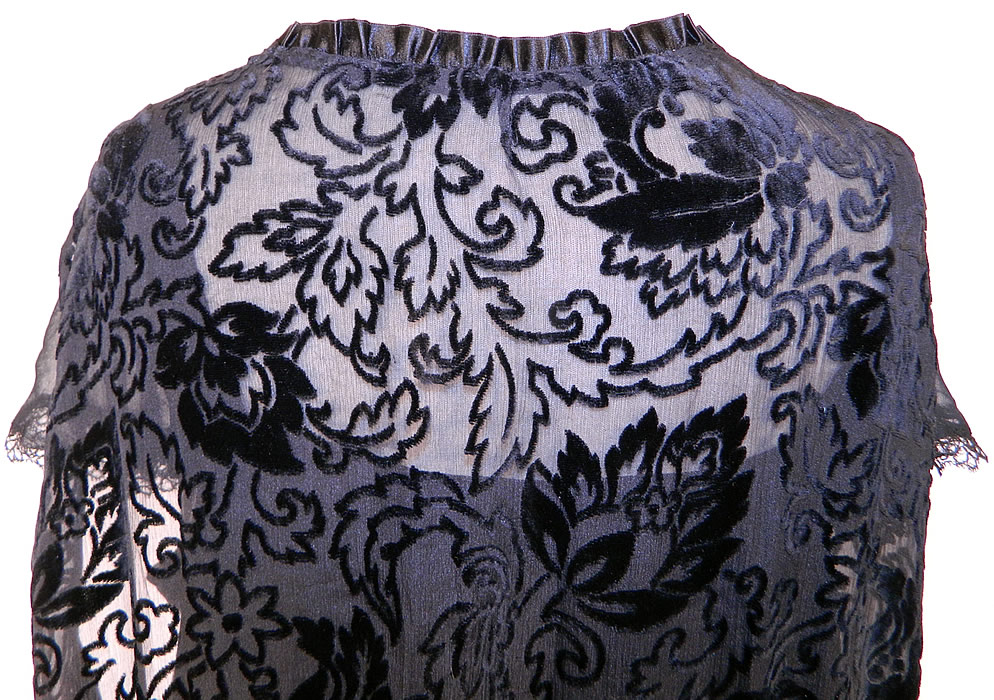 Vintage Silver Lace Black Burnout Voided Velvet Silk Drop Waist Flapper Dress
It is in good condition. This is truly a wonderful piece of wearable Art Deco textile art!