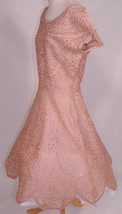 Vintage Blush Pink Sheer Scalloped Ribbonwork Hand Knit Crochet Circle Skirt Dress
The dress measures 40 inches long, with 38 inch hips, a 28 inch waist and 38 inch bust. It is in excellent condition, but missing the belt. 