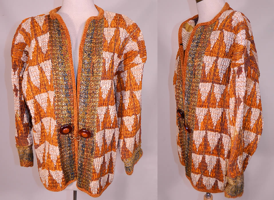 Vintage Pashtun Pakistan Swat Valley Embroidered Textile Tucks Gathering Coat
This vintage Pashtun Pakistan Swat Valley ethnic embroidered textile tucks gathering coat dates from the 1980s. It is made of an antique late 19th century brown linen fabric, with orange and cream color silk embroidery work done in an abstract ethnic inspired triangle design.