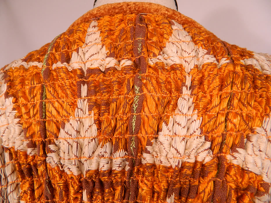 Vintage Pashtun Pakistan Swat Valley Embroidered Textile Tucks Gathering Coat
The coat measures 25 inches long, with a 36 inch waist, 40 inch bust and 17 inch long sleeves. It is in excellent condition. This is truly an exceptional custom made piece of wearable textile art!