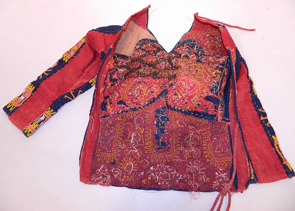 Vintage Antique Indian Gujarati Kutch Work Embroidered Mirror Choli Boho Blouse Top
This is truly a wonderful piece of Indian Pakistani folk culture colorful boho wearable art!