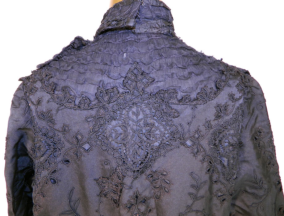 Victorian Black Silk Taffeta Bobbin Lace Mourning Gown Bodice Train Skirt Dress
The skirt measures 48 inches long in the front, 55 inches long in the back, with a 30 inch waist. It is in good as-is condition, with some fraying separation of the lace appliques on the skirt and front top (see close-ups). This would be great for display, design, study, pattern or restoration. It is truly a wonderful piece of Victoriana mourning wearable art!