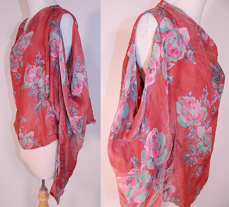 Vintage Crimson Red Gold Lam&eacute; Lame Pink Floral Roses Print Blouse Shirt Top
This beautiful blouse has a short cropped style, with weighted cut out, peek-a-boo shoulders, long full tapered sleeves with fitted cuffs, a weighted drape front neckline, key hole opening button closure back and is unlined. 